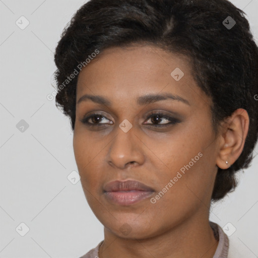 Neutral black young-adult female with short  brown hair and brown eyes