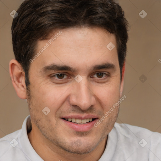 Joyful white adult male with short  brown hair and brown eyes