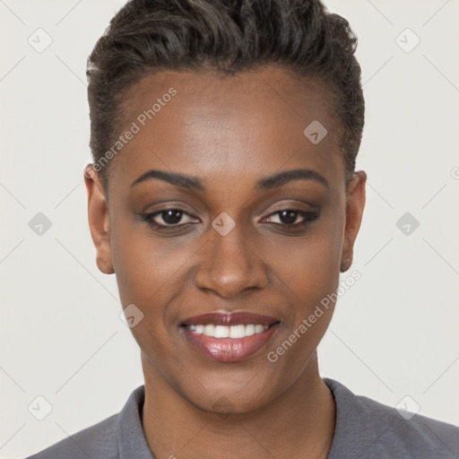 Joyful black young-adult female with short  brown hair and brown eyes