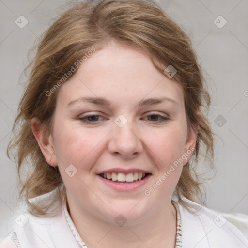 Joyful white young-adult female with medium  brown hair and blue eyes