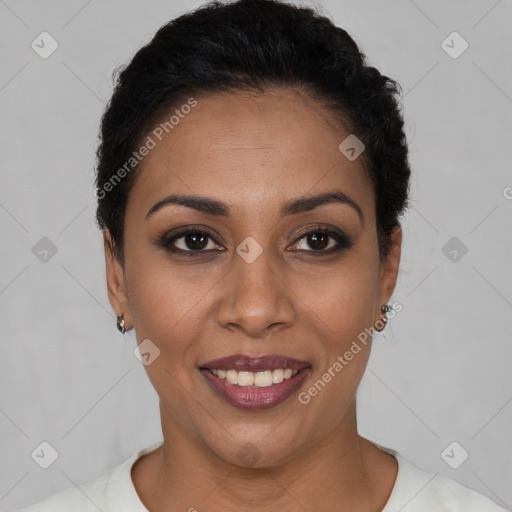 Joyful latino young-adult female with short  black hair and brown eyes