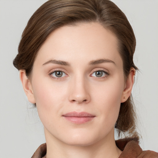 Neutral white young-adult female with medium  brown hair and grey eyes