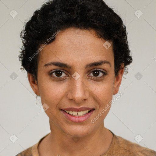 Joyful latino young-adult female with short  brown hair and brown eyes