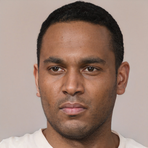 Neutral black young-adult male with short  black hair and brown eyes