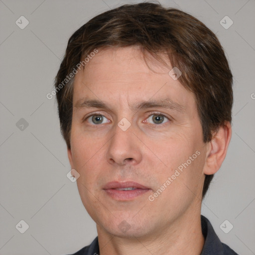 Neutral white adult male with short  brown hair and brown eyes