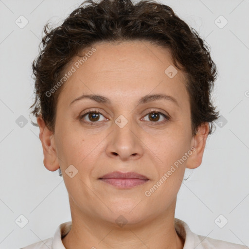 Joyful white adult female with short  brown hair and brown eyes