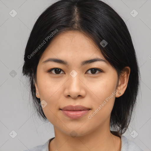 Joyful asian young-adult female with medium  black hair and brown eyes