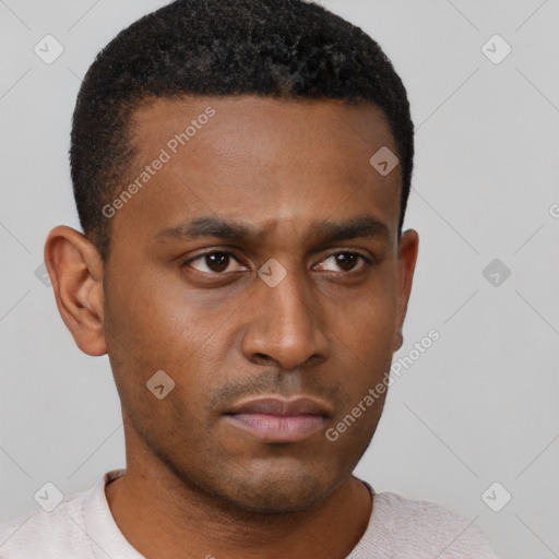 Neutral latino young-adult male with short  brown hair and brown eyes
