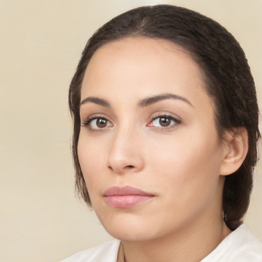 Neutral white young-adult female with medium  brown hair and brown eyes