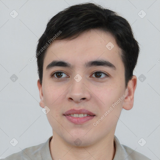 Joyful white young-adult male with short  black hair and brown eyes