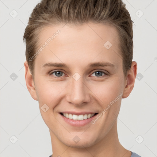 Joyful white young-adult female with short  brown hair and grey eyes