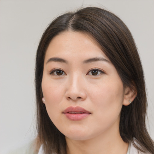 Neutral white young-adult female with medium  brown hair and brown eyes