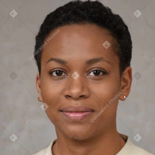 Joyful black young-adult female with short  brown hair and brown eyes