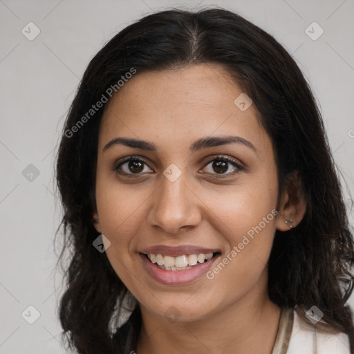 Joyful latino young-adult female with long  brown hair and brown eyes