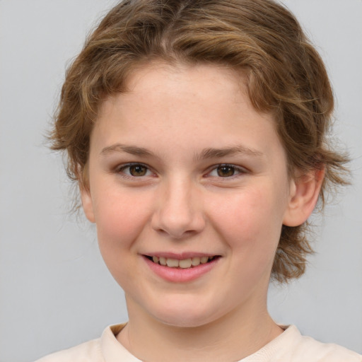 Joyful white child female with medium  brown hair and brown eyes