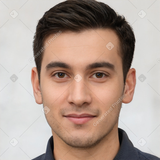 Joyful white young-adult male with short  brown hair and brown eyes