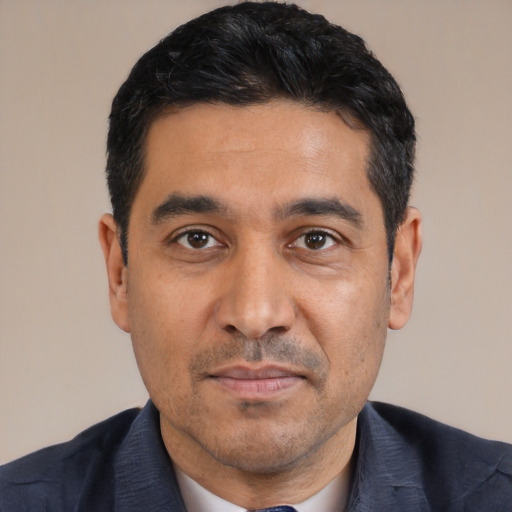 Neutral latino adult male with short  black hair and brown eyes