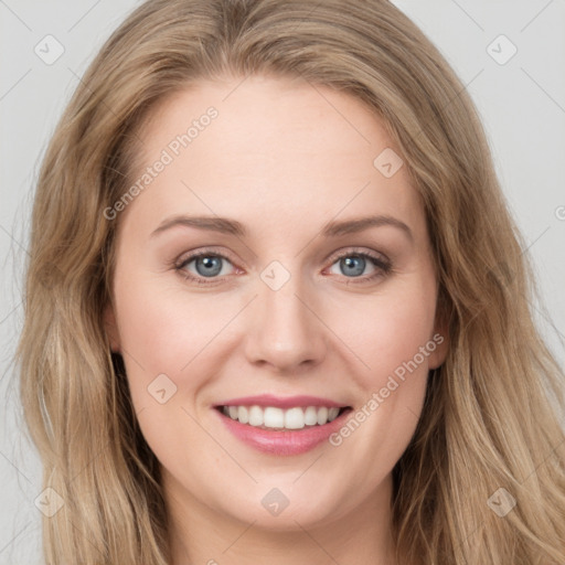 Joyful white young-adult female with long  brown hair and green eyes