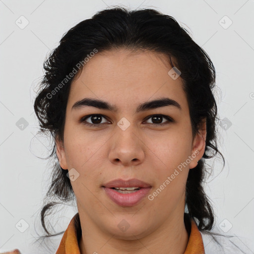 Joyful latino young-adult female with medium  brown hair and brown eyes