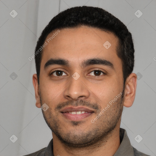 Joyful latino young-adult male with short  black hair and brown eyes