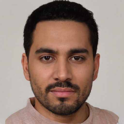 Neutral latino young-adult male with short  black hair and brown eyes