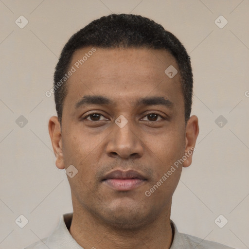 Neutral latino young-adult male with short  black hair and brown eyes