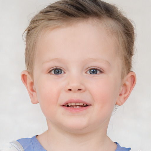 Joyful white child female with short  brown hair and blue eyes