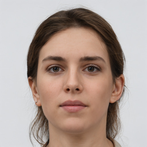 Neutral white young-adult female with medium  brown hair and grey eyes