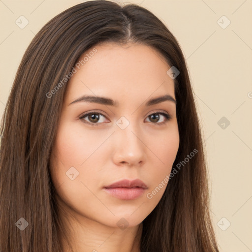 Neutral white young-adult female with long  brown hair and brown eyes