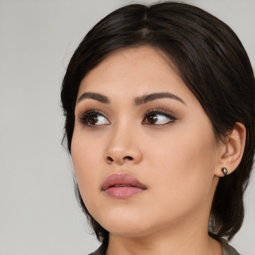 Neutral asian young-adult female with long  black hair and brown eyes