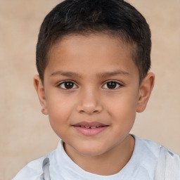 Joyful white child male with short  brown hair and brown eyes