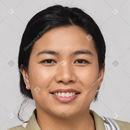 Joyful asian young-adult female with medium  black hair and brown eyes