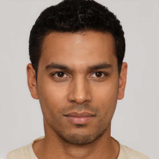 Neutral latino young-adult male with short  brown hair and brown eyes