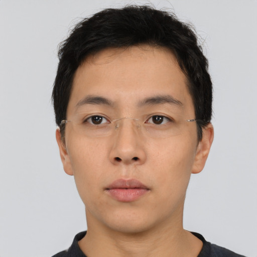 Neutral asian young-adult male with short  brown hair and brown eyes