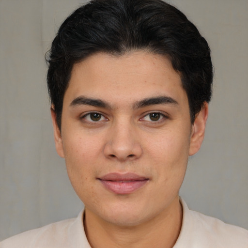 Joyful latino young-adult male with short  brown hair and brown eyes