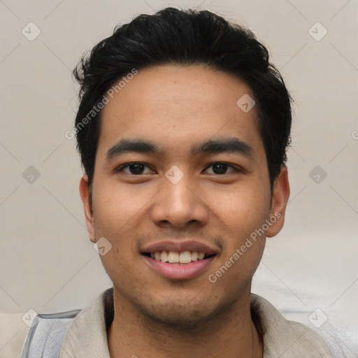 Joyful asian young-adult male with short  black hair and brown eyes