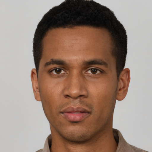 Neutral black young-adult male with short  black hair and brown eyes