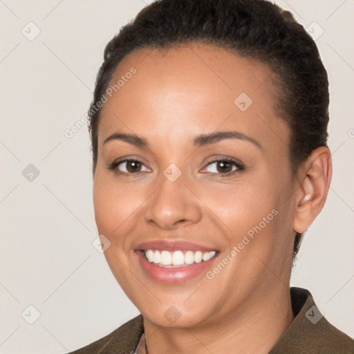 Joyful white young-adult female with short  brown hair and brown eyes