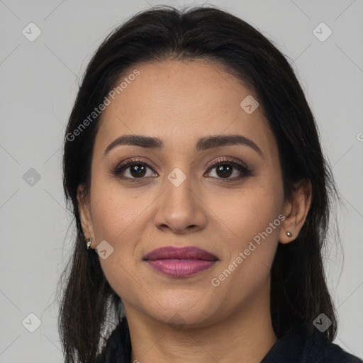 Joyful latino young-adult female with long  black hair and brown eyes