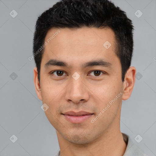 Joyful white young-adult male with short  black hair and brown eyes