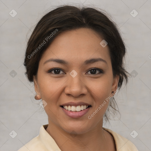 Joyful latino young-adult female with medium  brown hair and brown eyes