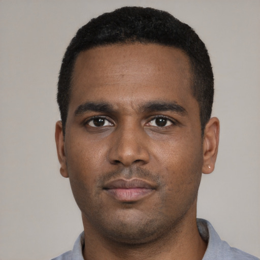 Neutral black young-adult male with short  black hair and brown eyes
