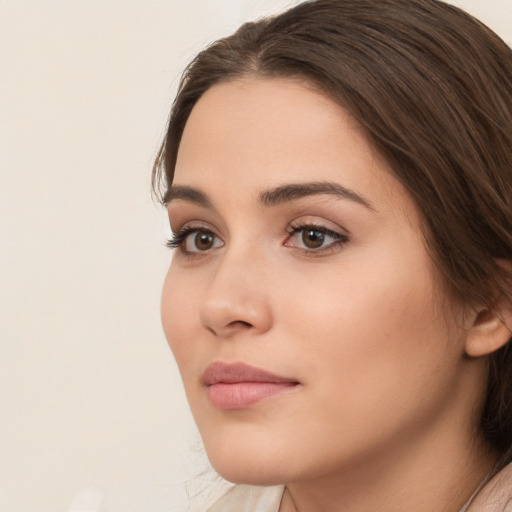 Neutral white young-adult female with medium  brown hair and brown eyes