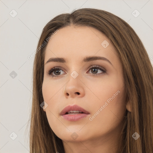 Neutral white young-adult female with long  brown hair and brown eyes