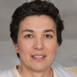 Joyful white adult female with short  brown hair and brown eyes