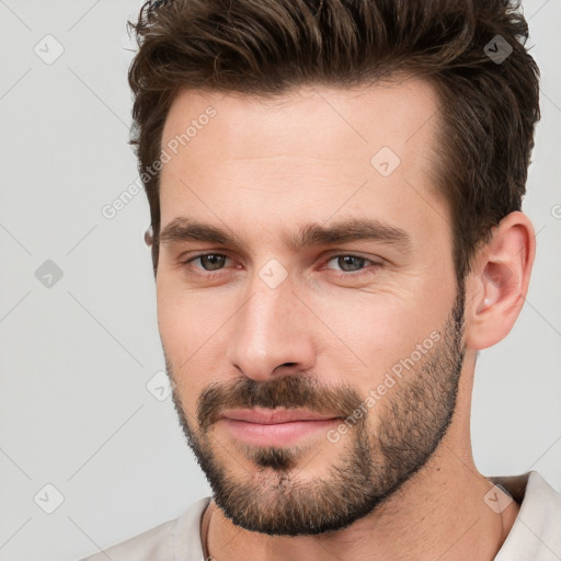 Neutral white young-adult male with short  brown hair and brown eyes