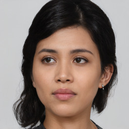 Neutral asian young-adult female with medium  black hair and brown eyes