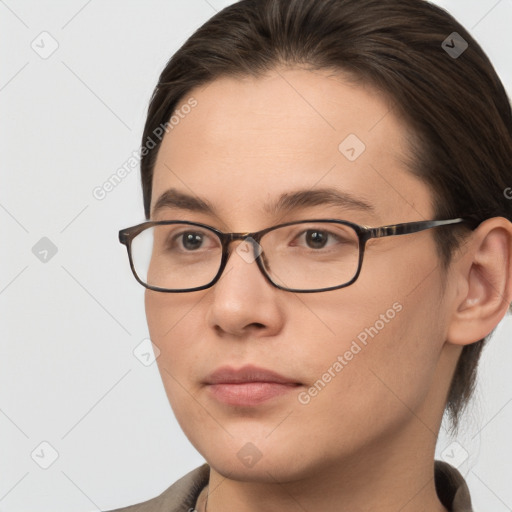 Neutral white young-adult female with medium  brown hair and brown eyes