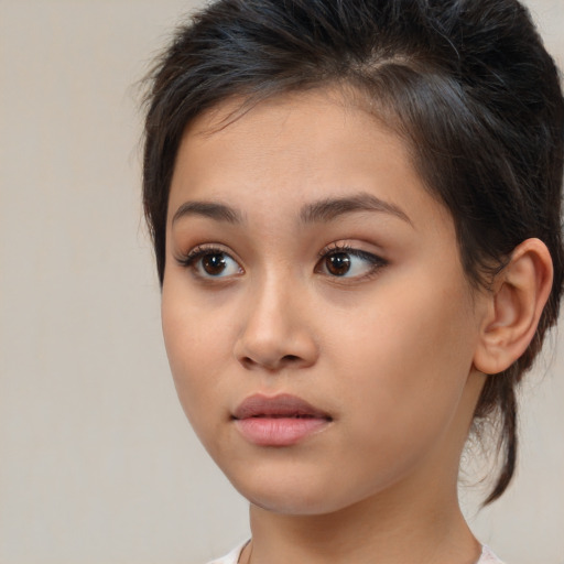 Neutral white young-adult female with medium  brown hair and brown eyes