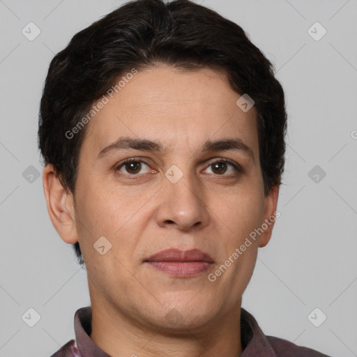 Joyful white adult male with short  brown hair and brown eyes